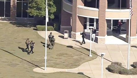 In this image from WFAA-TV video, law enforcement arrives at Timberview High School. (Photo | AP)