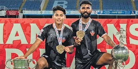 Muhammed Nemil Vailiyattil (left) and Christy Davis with the Durand Cup trophy after FC Goa beat Mohammedan SC in Kolkata. (Photo| EPS)