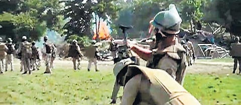 Representational image of Assam police during an eviction drive in Darrang, Sept 23, 2021.