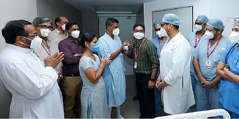 Vinod thanking the doctors and staff while getting discharged from Rajagiri Hospital on Thursday. (Photo | Express)