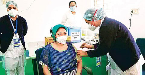 A beneficiary receiving Covid-19 vaccination dose at a centre in New Delhi on Saturday