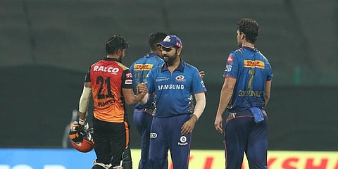 Mumbai Indians celebrate their win against SRH in their last IPL encounter for 2021. (Photo | Twitter/IPL)