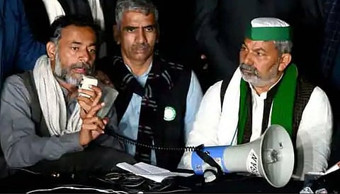 SKM leader Yogendra Yadav and BKU supremo Rakesh Tikait (Photo | Twitter/@_JaiKisan)