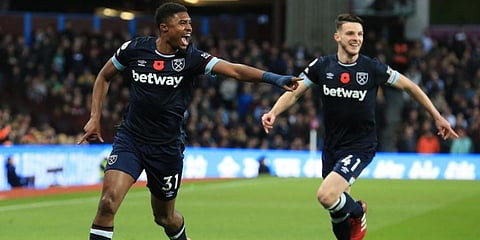 West Ham United defender Ben Johnson (L) celebrates with Declan Rice (R) after scoring. (Photo | AFP)