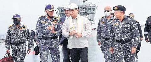 Sarbananda Sonowal, Union Minister of Ports, Shipping and Waterways, on board IAC Vikrant along with Indian Navy officers on Sunday.