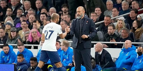 Tottenham's head coach Nuno Espirito Santo, right, shakes hands with Tottenham's Lucas Moura during the English Premier League match against Manchester United. (Photo | AP)