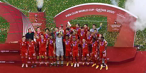 FILE - FC Bayern Munich's goalkeeper Manuel Neuer holds up the Club World Cup trophy at at the Education City stadium in Al Rayyan, Qatar, Thursday, Feb. 11, 2021. (Photo | AP)