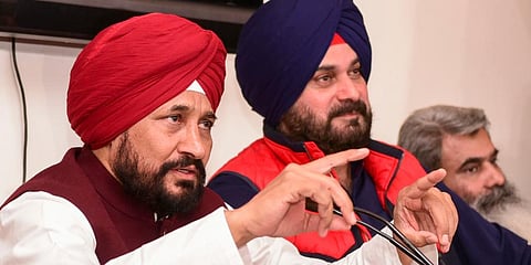 Punjab CM Charanjit Singh Channi addresses a press conference in Chandigarh, Tuesday, Nov. 9, 2021. PPCC President Navjot Singh Sidhu is also seen. (Photo | PTI)
