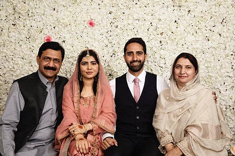 Malala Yousufzai with husband Asser Malik and family members. (Photo | Twitter)