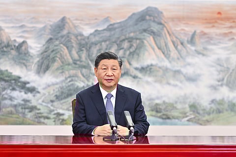 In this photo released by Xinhua News Agency, Chinese President Xi Jinping delivers a keynote speech for the Asia-Pacific Economic Cooperation (APEC) CEO Summit via video, from Beijing. (AP)