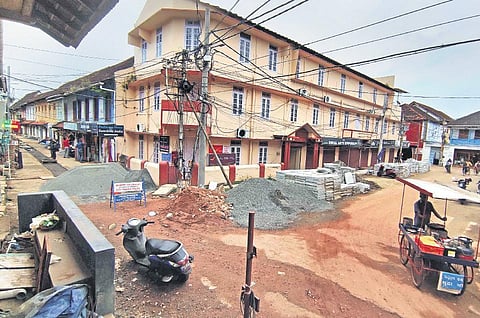The construction materials for the works taken up by CSML are piled up in front of the shops in Jew Town in Mattanchery | A Sanesh