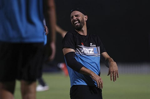 New Zealand's Daryl Mitchell shares a light moment with a teammate during a training session ahead of their Cricket Twenty20 World Cup final. (Photo | AP)