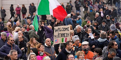People gather for a protest against the COVID-19 vaccination green pass, attended by Robert F. Kennedy Jr., son of Robert Kennedy, in Milan, Italy. (Photo | AP)