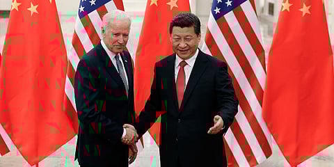 US President Joe Biden (R) interacts with his Chinese counterpart Xi Jinping (File Photo | AP)