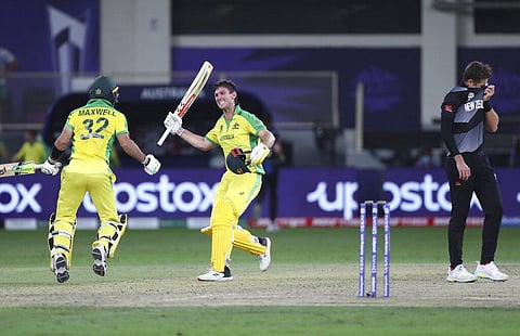 Australia's Glenn Maxwell, left, and Mitchell Marsh celebrate after winning the Cricket Twenty20 World Cup final match between New Zealand and Australia. (Photo | AP)