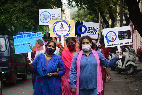 Health workers take out a rally on ‘World Diabetes Day’ at Vasanthnagar UPHC on Sunday. (Photo | Ashishkrishna HP, EPS)