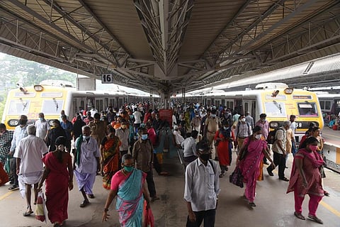 Passenger coming out of the suburban trains in Chennai on Monday. (Photo | R Satish Babu, EPS)