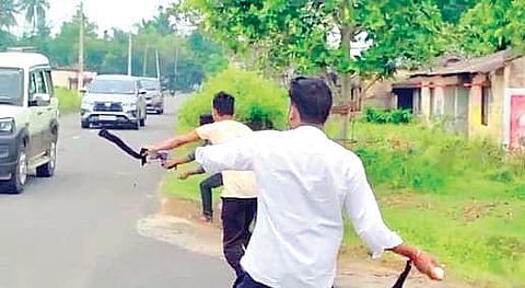 Student Congress workers hurling eggs at Union Minister of State for Jal Shakti and Tribal Affairs Bishweswar Tudu’s carcade. (Photo | Express)