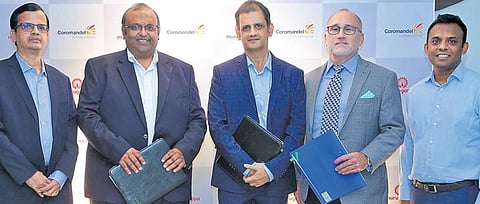 Dignitaries from Coromandel, TKIS India and MECS during the agreement signing