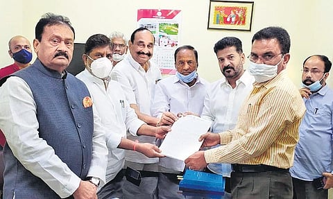 TPCC president and MP A Revanth Reddy and other Congress leaders submit a representation to the Chief Electoral Officer, in Hyderabad on Wednesday, Nov 17, 2021. (Photo | EPS)