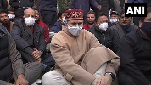 Omar Abdullah staged a sit-in demanding the return of bodies of civilians killed in the Hyderpora encounter. (Photo | Twitter/ANI)