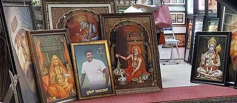 A photo frame of Puneeth Rajkumar at a shop in Hosapete (Photo | Express)