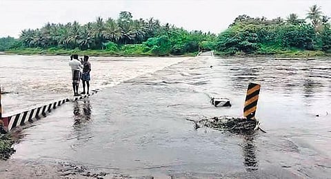 The Vilayodi bridge across the Chitturpuzha which was submerged after the shutters of the Aliyar dam were opened by Tamil Nadu on Thursday