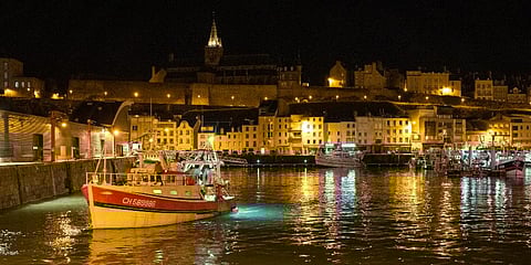 A French trawler heading to the U.K waters, leaves the port of Granville, Normandy. (Photo | AP)