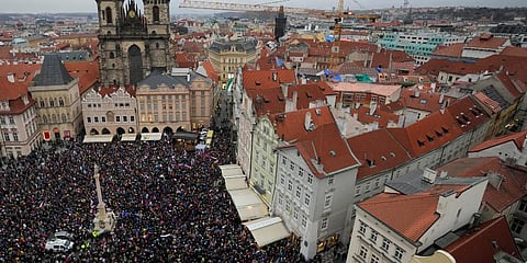 Demonstrators protest against the government restriction measures to curb the spread of COVID-19 during celebrations of the 32nd anniversary of pro-democratic Velvet Revolution in Czech. (Photo | AP)