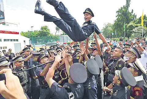 Cadets celebrate after graduating from the OTA in Chennai on Saturday | Express