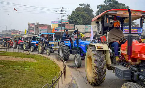 Farmers take out a tractor march as part of a protest against the new farm laws. (File photo | PTI)