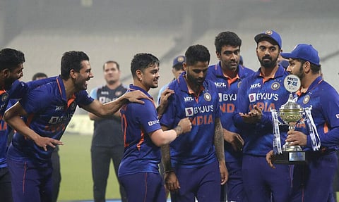 India's captain Rohit Sharma, right, walks with the winners trophy after their win in the third Twenty20 cricket match against New Zealand in Kolkata. (Photo | AP)