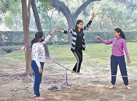 Anushka Bhandari (in purple) and her friends trying slacklining for the first time