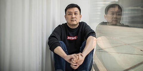 US citizen Daniel Hsu poses for a portrait in the apartment in Shanghai, China. (Photo | AP)