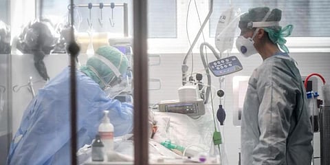 Medical personnel at work in the intensive care unit of the hospital of Brescia, Italy. (File Photo | AP)