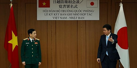 Vietnam's Defense Minister General Phan Van Giang, left, meets with Japan's Defense Minister Nobuo Kishi at the Defense Ministry in Tokyo, Tuesday, Nov. 23, 2021. (Photo | AP)