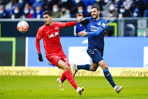Leipzig's Andre Silva, left, and Hoffenheim's Florian Grillitsch fight for the ball during a German Bundesliga (Photo | AP)