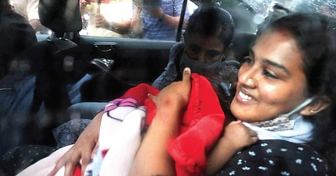 Anupama S Chandran leaves for home with her child after securing a favourable order over her son’s custody, at Vanchiyoor inThiruvananthapuram | Vincent Pulickal