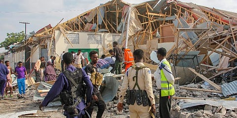 Security forces and rescue workers search for bodies at the scene of a blast in Mogadishu, Somalia Thursday, Nov. 25, 2021. (Photo | AP)