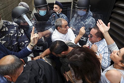 The nearly dozen protesters who entered the Ministry of Social Affairs said conditions in the crisis-hit country have become unbearable as a result of the rapid economic collapse (Photo | AP)