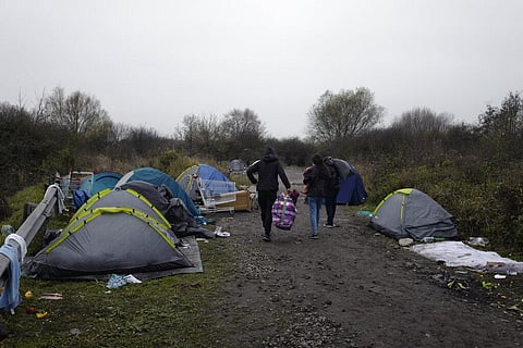 A migrants makeshift camp is set up along the river in Loon Plage, near Grande-Synthe, northern France (Photo | AP)