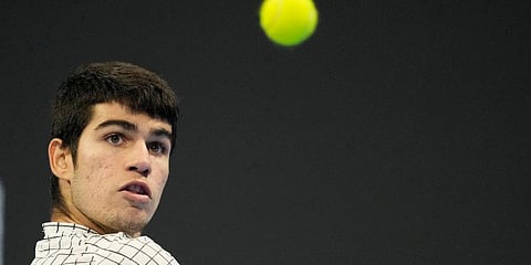 Spain's Carlos Alcaraz returns the ball to United States' Sebastian Korda during the ATP Next Gen final tennis tournament in Milan, Italy, Saturday, Nov. 13, 2021. (Photo | AP)