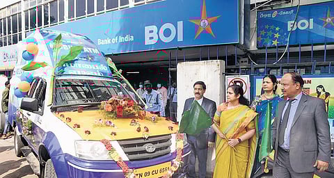 A mobile ATM inaugurated at Bank of India, Parry’s Corner Branch, in Chennai on Thursday. (From Left) Srinivasa Rao, Deputy Zonal Manager, Monika Kalia, Executive Director, and Sharda Bhushan Rai, GM
