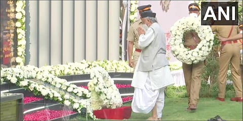 Maharashtra governor BS Koshyari pays floral tributes to martyrs at the police headquarters in south Mumbai. (Photo| ANI)