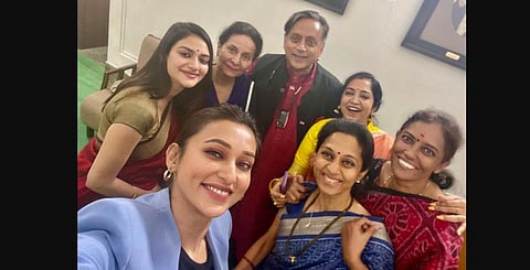 Congress leader Shashi Tharoor with women MPs Supriya Sule, Preneet Kaur, Thamizhachi Thangapandian, Mimi Chakraborty, Nusrat Jahan Ruhi and Jyothimani. (Photo | Twitter)