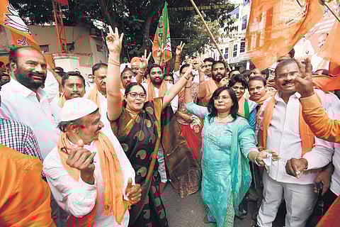 BJP supporters celebrate the return of Eatala Rajender as MLA of the Huzurabad Assembly constituency on Tuesday