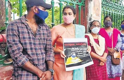 Anupama holds a placard stating ‘a mother is being denied justice’ | File pic