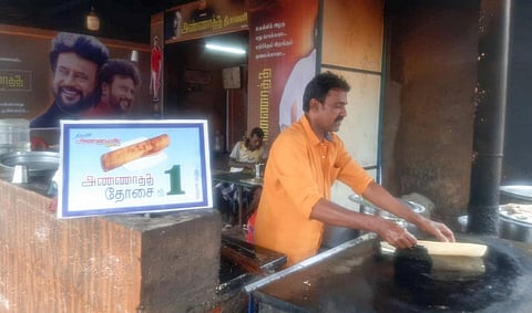 S Karnan making dosa at his eatery, Annamalai Hotel, in Ramji Nagar, Tiruchy on Tuesday| Express