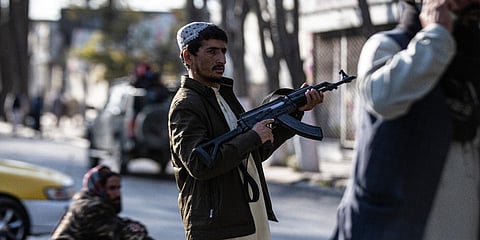Taliban fighters block roads after an explosion at a military hospital in Kabul. (Photo| AP)