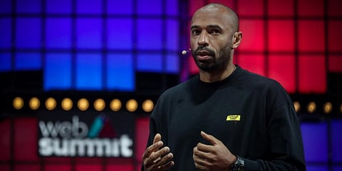 Former French football player Thierry Henry delivers a speech at the main stage of the Web Summit in Lisbon. (Photo | AFP)